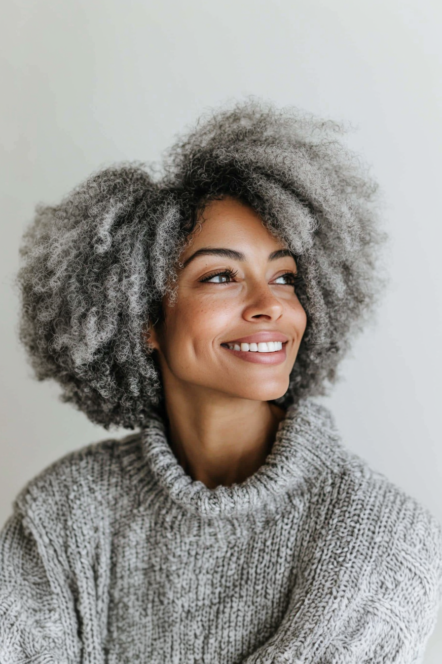 13. Short Curly Afro in Natural Gray (Hairstyles For Older Women With Curly Hair) - Hairstyles For Older Women With Curly Hair